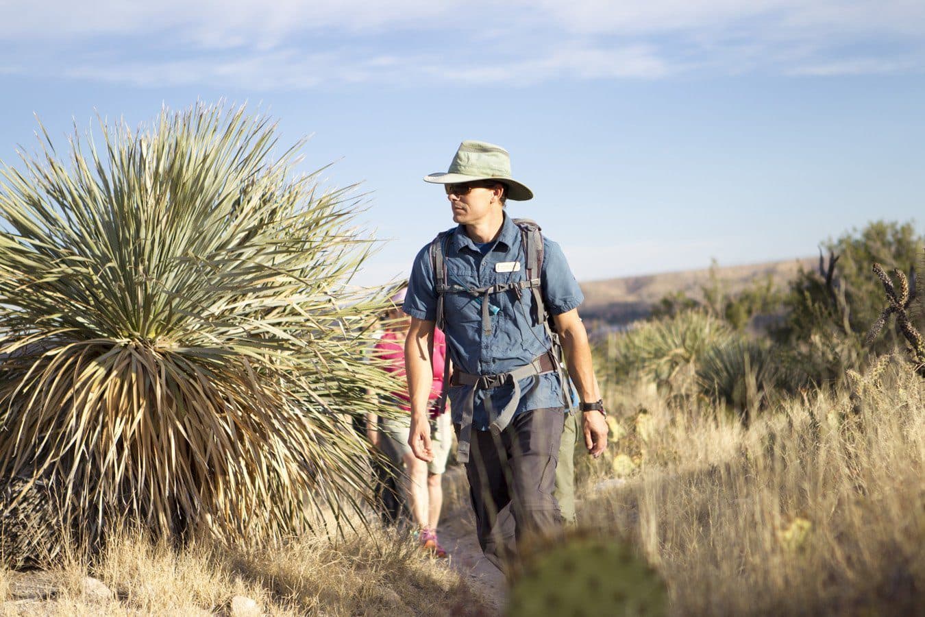 person wearing hiking gear walking