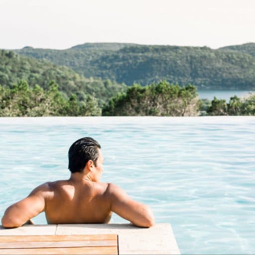 person relaxing in a pool